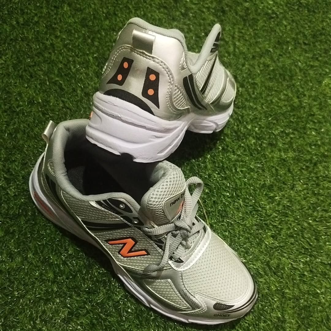 کتونی نیوبالانس نارنجی طوسی از طریق سایت ودایرکت